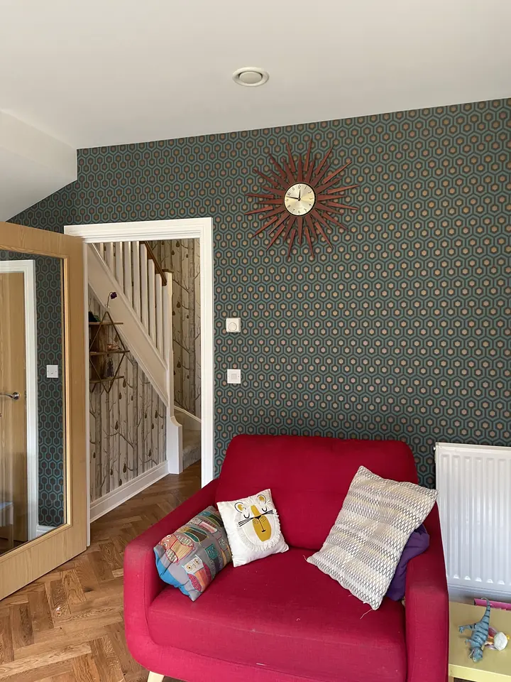 Wallpaper detail in a stairwell entrance with carefully finished edges